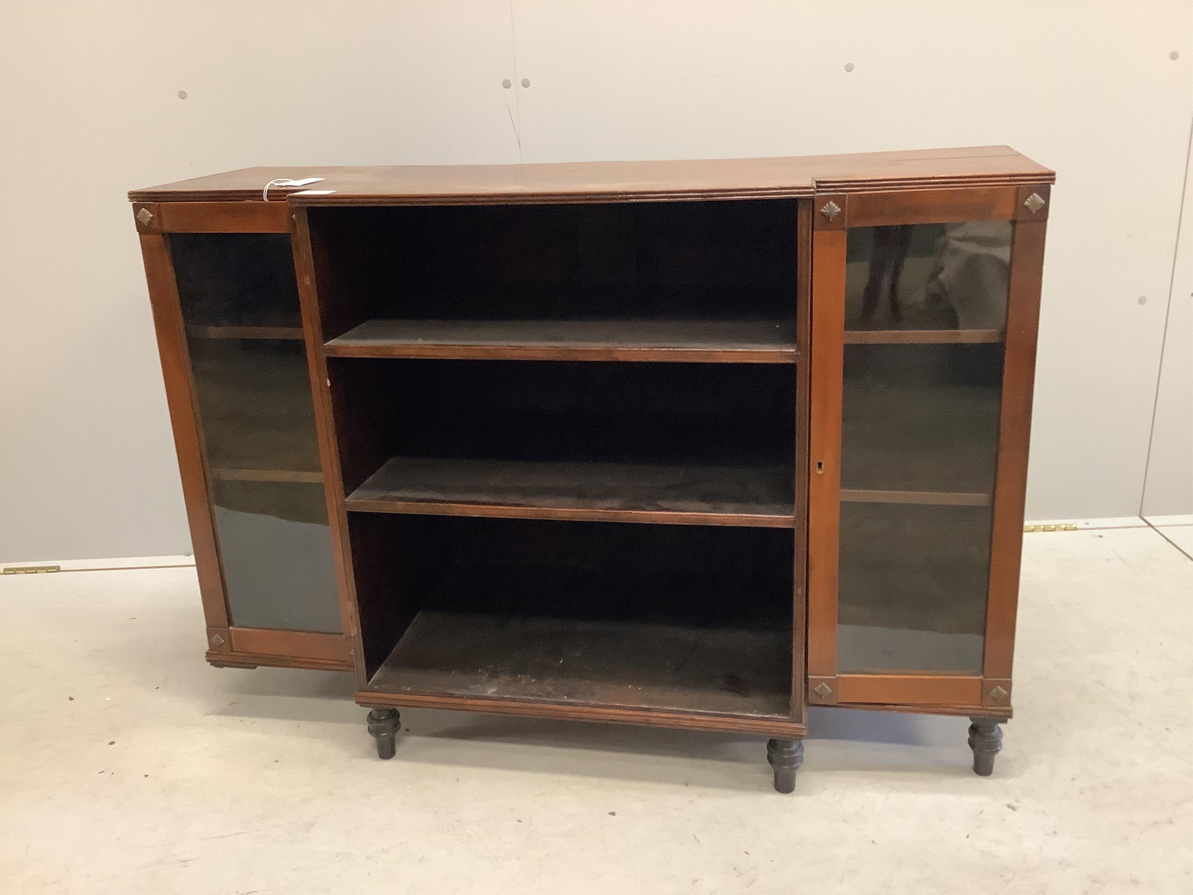 A Regency style mahogany breakfront dwarf bookcase, width 112cm, depth 42cm, height 79cm. Condition - poor